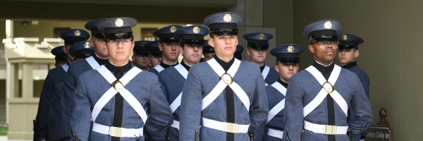 Uniformed members of the VMI Corps of Cadets prepare to march out of barracks, what VMI uses as a dorm for each cadet.