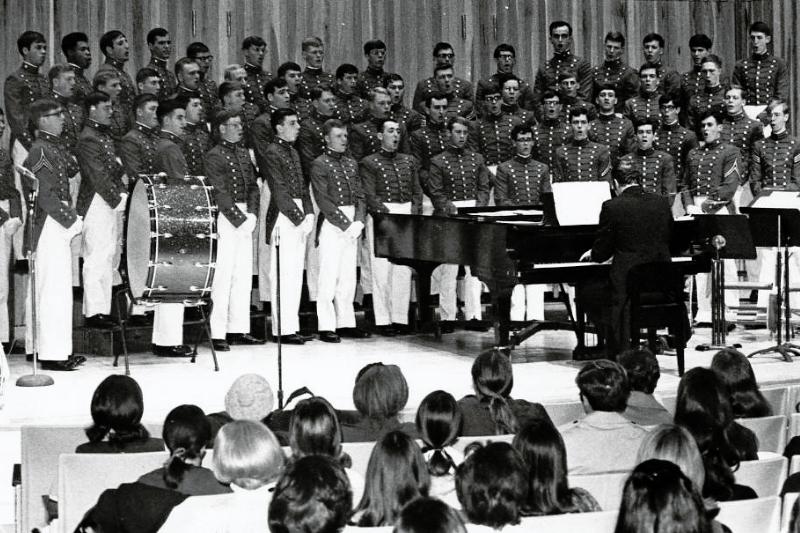 The VMI Glee Club led by Director Allen George Biester performs before an audience, ca. 1970.