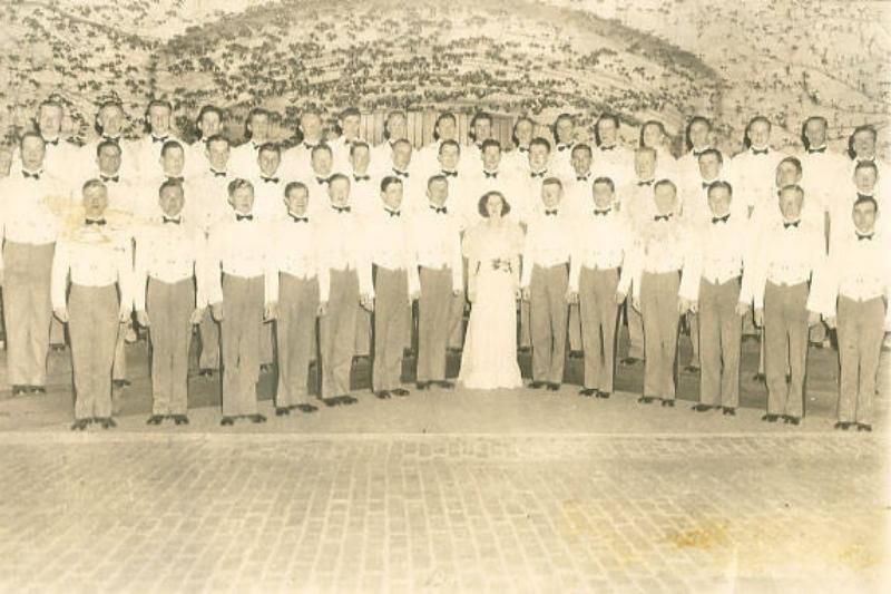 The first organized VMI Glee Club with Director Mrs. Marguerite Ramey.  Mrs. Ramey, the wife of faculty member M. G. Ramey, ser. VMI Archives