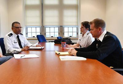Maj. Jennifer Gerow and Lt. Col. Spencer Bakich confer with Col. Mohamed Eltoweissy on the cybersecurity minor. – VMI Photo by Kelly Nye.