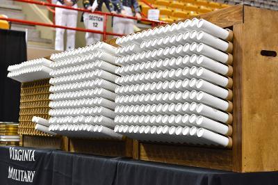 An image of diplomas stacked and ready for distribution.
