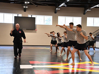 Col. Mike Krakow instructs his karate class.