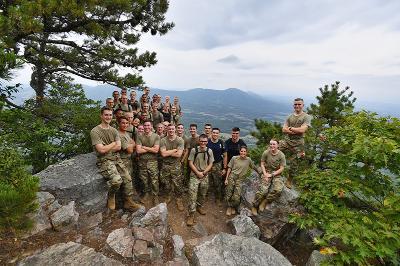 New cadets pose for a photo atop House Mountain.