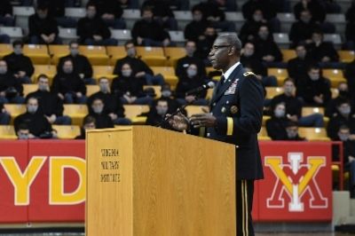 Maj Gen Cedric Wins speaking to the Corps