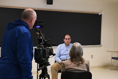 Dr. Mohamed Azab discusses the cyber defense internship program with local media. -VMI Photo by Kelly Nye.