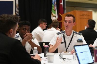 Cadets participating in table discussion