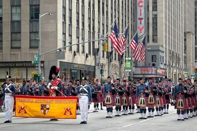 The VMI Pipe Band performs in the Tartan Day Parade in front of Radio City Music Hall.—VMI Photo by Command Sgt. Maj. Suzanne Rubenstein