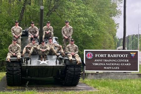 Members of the VMI combat shooting club team take a tank break after their victory at the ROTC College Clash Marksmanship Competition at Fort Barfoot. —Photo courtesy of Kenneth Dinkel ’25.
