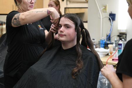 Sean Bergman ’28, a history major from Richmond, donated his hair during Matriculation Day Aug. 17, 2024.