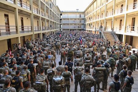 Cadets gather in New Barracks for speeches and a moment of silence before the stair climb.