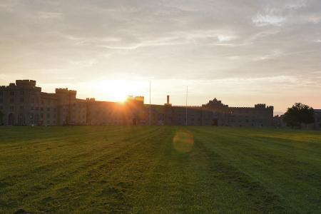 VMI Barracks during a sunset.
